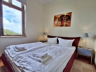 1. Schlafzimmer mit Meerblick