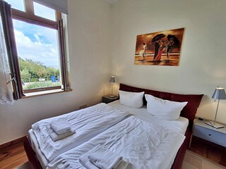 1. Schlafzimmer mit Meerblick