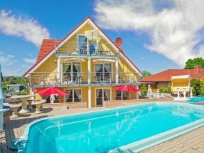 Ferienwohnung Villa Europa - Wohnungen mit Kamin und gemeinsamen Pool