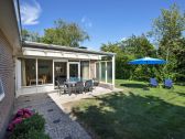 Bungalow typ D mit Terrasse und Wiese