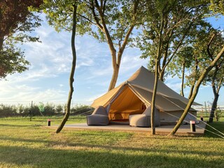 Glamping bell tent (with a real bed!)