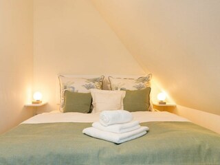 zweites Schlafzimmer mit Boxspringbett