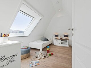 Schlafzimmer im oberen Bereich