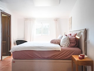 Schlafzimmer 1 mit Bad en Suite