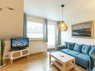Wohnzimmer mit Südwest-Balkon