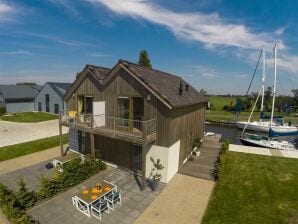 Holiday house Stavoren, holiday home by the water at the marina FR087 - Stavoren - image1