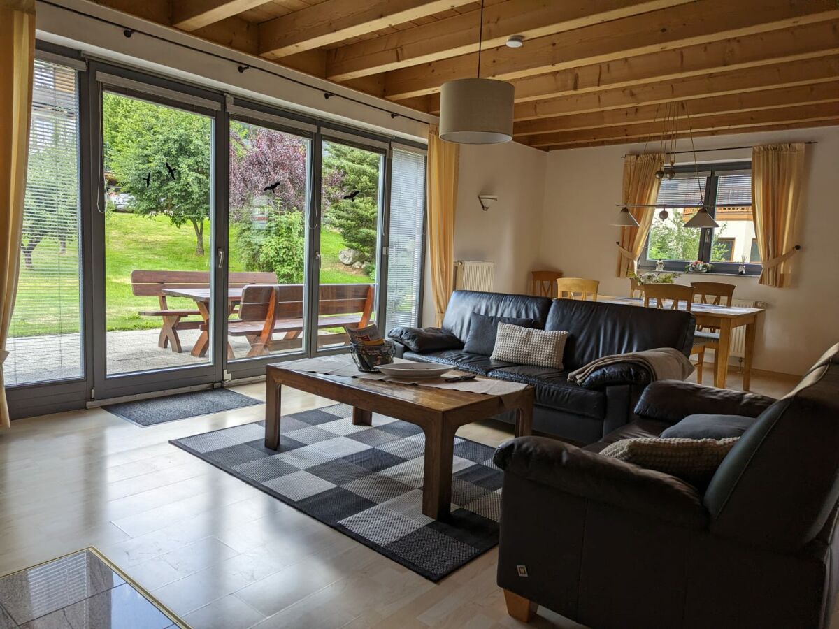 View into living/dining room and garden