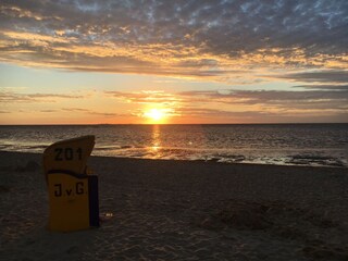 Jeden Abend Sonnenuntergang am Strand