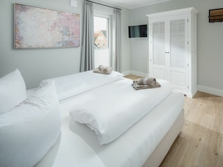 SandWärme Norderney / Schlafzimmer 1 (Doppelbett)
