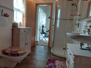 View from the bathroom upper floor to the hallway