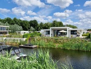 Casa de vacaciones Water Villa en Zeewolde cerca de Harderwijk con embarcadero privado y terraza - Biddinghuizen - image1