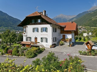 das Bauernhaus mit dem Garten