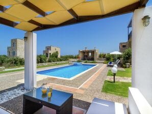 Villa en pierre en bord de mer avec piscine privée - Tavronite - image1