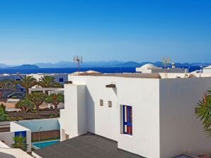 Maison de vacances Charmante maison avec piscine et vue sur la mer - Plage Blanca - image1