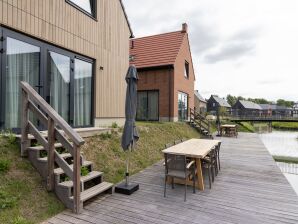Villa by Lake Veere with Sauna and Terrace