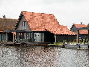 Holiday park Wasservilla mit zwei Bäder in einem Ferienpark in der Nähe der friesischen Seen - Ossenzijl - image1