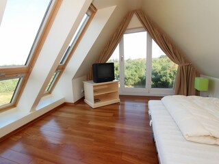 Schlafzimmer 2 im Dachgeschoss OG
