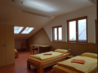 Schlafzimmer mit 4 Betten