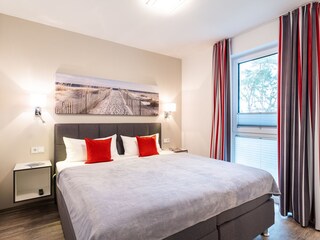 Schlafzimmer mit Badezimmer en Suite