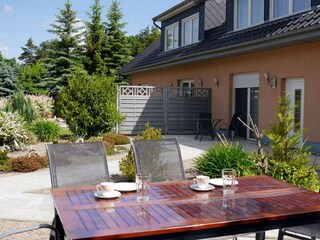 Front garden with terrace for upper floor apartment