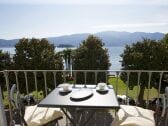 Kleiner Balkon mit traumhafter See-, Insel- und Alpensicht