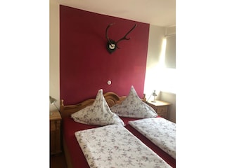 Schlafzimmer 1 mit Doppelbett