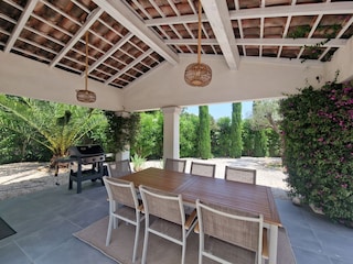 Terrace with dining table and bbq