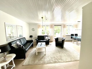 Wohnzimmer mit Schrankbetten