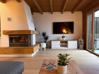 Wohnzimmer mit Warmluftcheminée