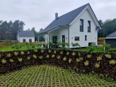 Haus Gartenansicht Terrasse