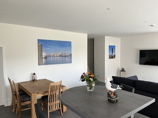 Ferienhaus Relax Wohnzimmer mit Esstisch