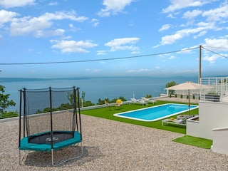 A private 33sqm swimming pool, a fully fenced playgroun