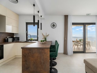 The kitchen island has all the amenities a modern guest