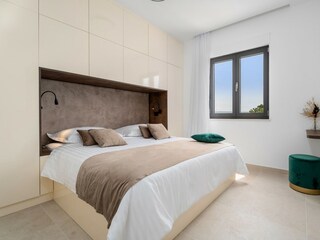 A Bedroom NO1 with a king-size bed 180cm x 200cm, a TV,