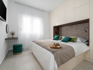 A Bedroom NO2 with a king-size bed 180cm x 200cm, a TV,