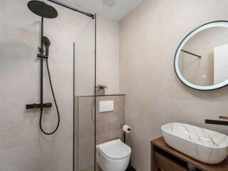 A Family bathroom No2 with a shower.