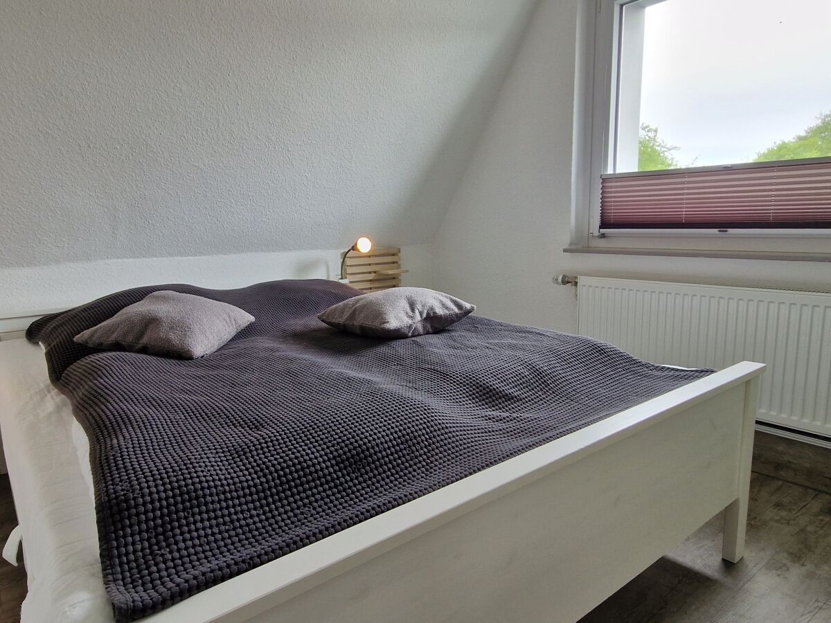 Schlafzimmer mit Doppelbett