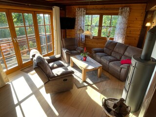 FeWo Hänsel / 4 pers. / living area with fireplace