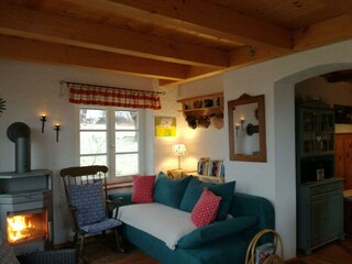 Veranda mit Kaminfeuer