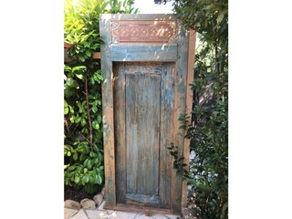 Balinese door to outdoor shower