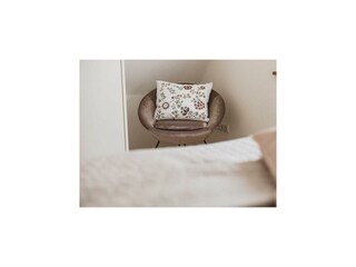 Lesestuhl im Appartement Weinrebe