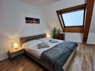Schlafzimmer im City-Appartement 2
