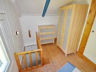 Schlafzimmer mit Etagenbett im Obergeschoss