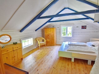 Schlafzimmer mit Doppelbett