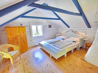 Schlafzimmer mit Doppelbett
