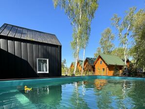 Maison de vacances Maisons de vacances avec piscine à Dziwnów pour 6 personnes - Dziwnow - image1