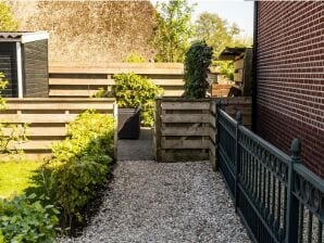 Weelderig vakantiehuis met tuin aan zee - Moddergat - image1