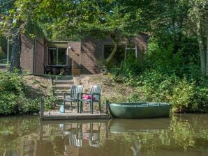 Bungalow sur l'eau avec son propre bateau à rames, dans un parc de vacances - Stramproy - image1