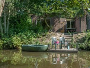 Bungalow pieds dans l'eau restylé avec barque, dans un parc de vacances - Stramproy - image1