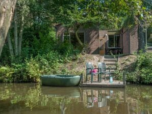 Gerestylede, aan het water gelegen bungalow met roeiboot, op een vakantiepark - Stramproy - image1